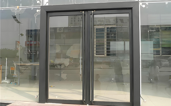 阿拉尔玻璃地弹门